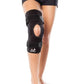 Das Bild zeigt die BioSkin Hinged Knee Sleeve Wraparound, eine stützende Kniebandage mit seitlichen Stäben zur Stabilisierung des Kniegelenks. Die Bandage besteht aus einem leichten, atmungsaktiven Material und ist so gestaltet, dass sie das Knie umschliesst und mit Klettverschlüssen individuell angepasst werden kann. 